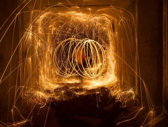 amazing-steel-wool-fire-circles-night-with-glowing-sparks_181624-44746