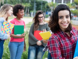 Optimized-bigstock-Hispanic-Female-Student-With-G-232863925