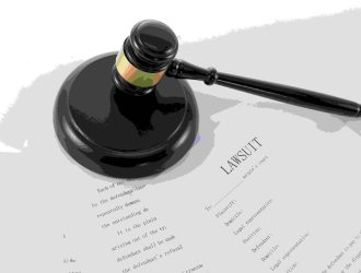 closeup-shot-judge-s-gavel-document-lawsuit (1)