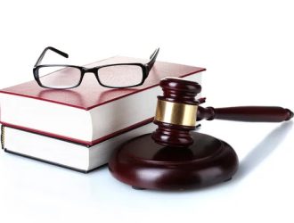 depositphotos_10147548-stock-photo-wooden-gavel-glasses-and-books (1)