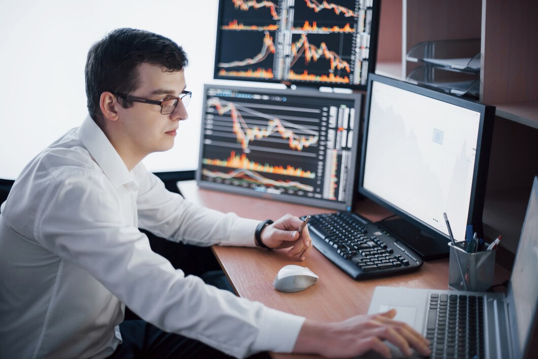 stockbroker-shirt-is-working-monitoring-room-with-display-screens-stock-exchange-trading-forex-finance-graphic-concept-businessmen-trading-stocks-online_146671-15012