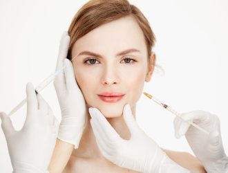 cosmetologists-hands-making-medical-botox-injections-beautiful-blonde-skin-lifting-facial-treatment-beauty-spa_176420-9347