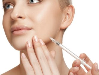 people-lips-cosmetology-plastic-surgery-beauty-concept-beautiful-young-woman-face-hand-with-syringe-making-injection_155003-33322