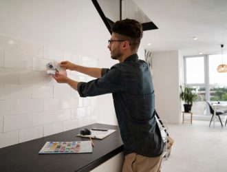 side-view-man-working-indoors_23-2149721881