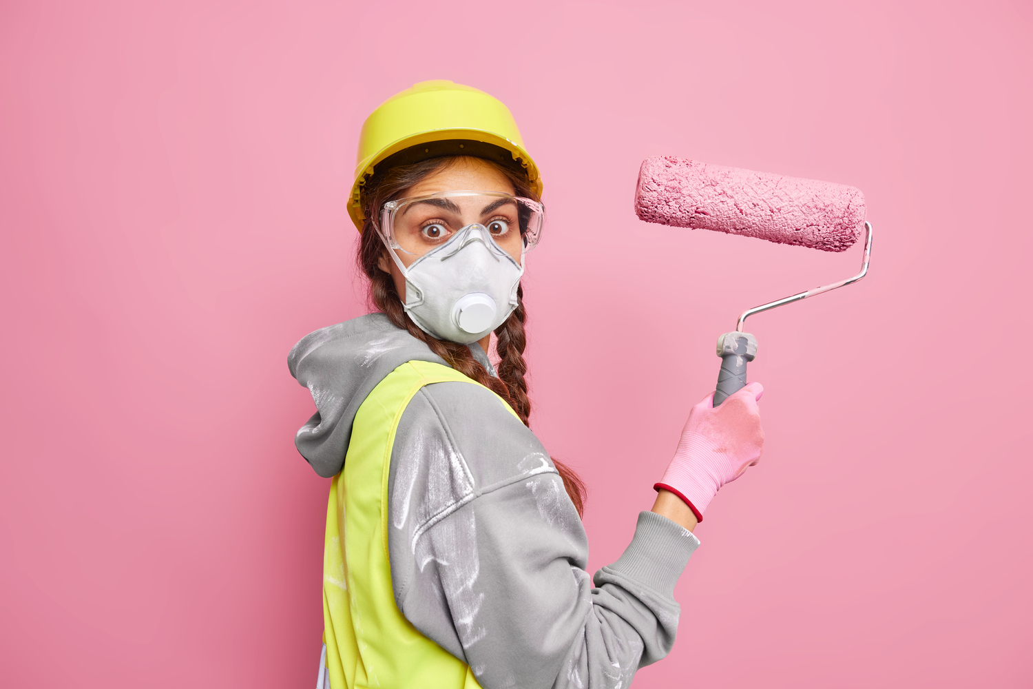 surprised-female-painter-moves-new-dwelling-busy-doing-repairing-holds-painting-roller (1)