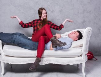 woman-sitting-man-sofa_23-2148001471